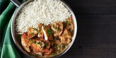 Turkey cutlets with soy cream and mushrooms