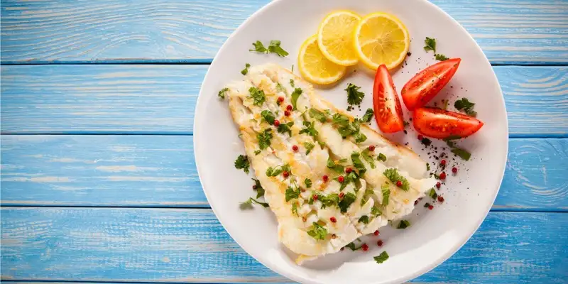 Bacalhau de amêndoa com tomate estufado