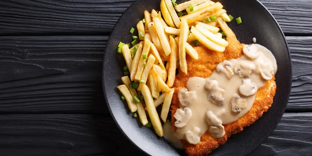 Veal escalope with mushrooms - recipe | FoodPal